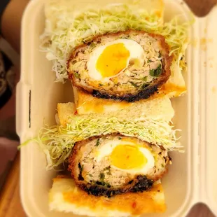 Tokyo gyoza Scotch egg sando