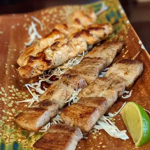 a plate of grilled fish