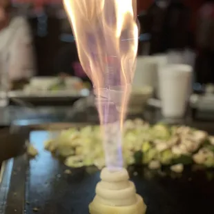 a flame coming out of a hot plate