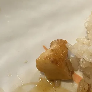 Seems like they cooked my food in a pan that had leftover chicken. This is definitely not piece of a shrimp.