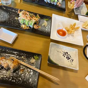Firework roll, pink lady roll, lion king roll, crab Rangoons