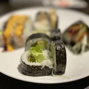 a plate of sushi on a table