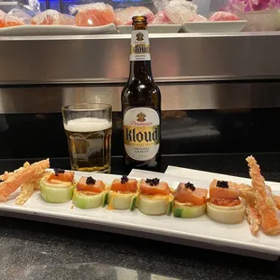 Chef Special. Cucumber, spicy tuna, seared smoked salmon and tobiko.