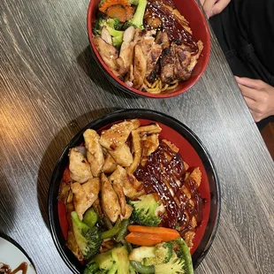 two bowls of food on a table