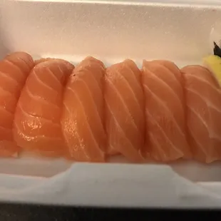 Three fresh salmon nigiri orders