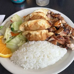 Lunch special with teriyaki chicken and gyoza.