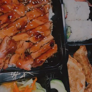 Chicken teriyaki, pot stickers bento box