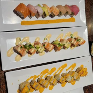 Sunkist, snow salmon, rainbow, spicy tuna crunch Rolls.