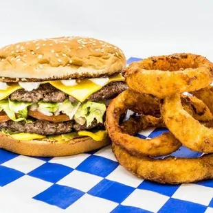 a hamburger and onion rings
