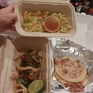 two takeout containers of food