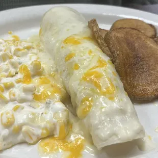 Avocado Enchiladas with Mexican potatoes and d sweet corn