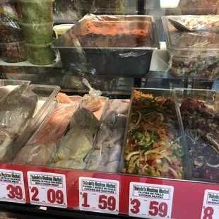 Guacamole, meats, civeche de pescado, pico de gallo