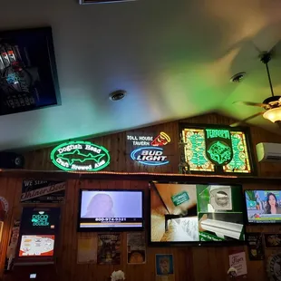 a variety of neon signs