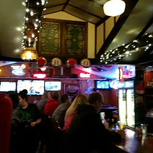 people sitting at the bar