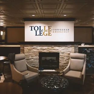 two chairs and a fireplace