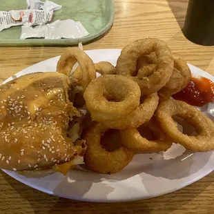 Burger plate with yummy onion rings.