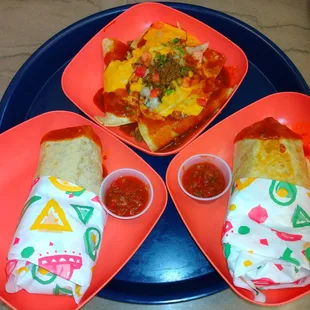 Beef enchilada, steak burrito and a chicken burrito