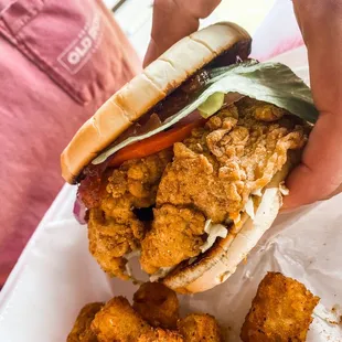 9 mile chicken sandwich with Cajun tots.