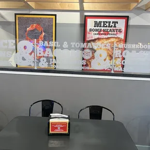 a table and chairs in a restaurant