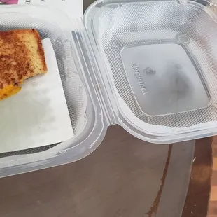 Half of my yummy grilled cheese. I couldn&apos;t resist or wait!
