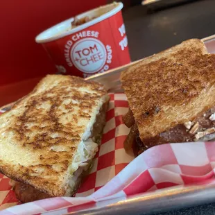 a grilled cheese sandwich on a tray
