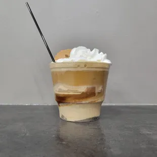 an iced coffee with whipped cream