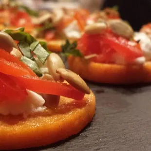 Roasted Persimmons, Goat Cheese, Pickled Peppadews, Pepitas &amp; Arugula