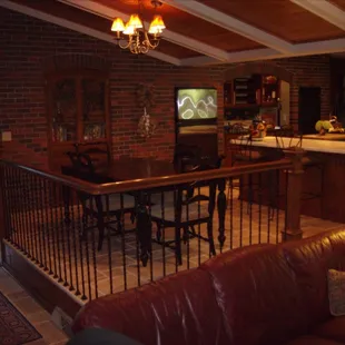 Kitchen, banister, stone floor