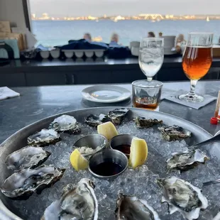 Dozen Happy Hour Oysters with a view.