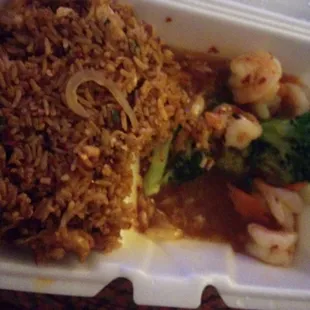 Dinner special. Shrimp w/ broccoli spicy and chicken fried rice.  Don&apos;t mind the quantity of shrimp, photo was shot after eating began.