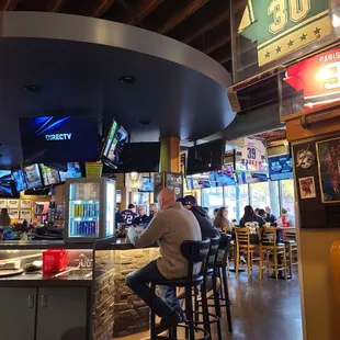 a man sitting at the bar