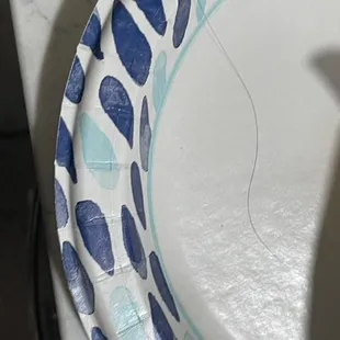 Strand of hair in food.