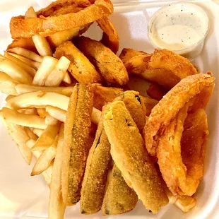 Tom&apos;s sampler side. Fries, zucchini (The best)! ...and onion rings. Ranch on the side, great.