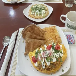 Chorizo omelette, cheese and chorizo empanadas, veggie omelette