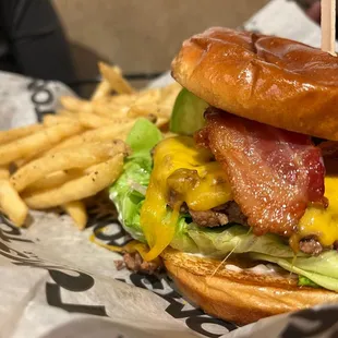 Bacon avocado burger with truffle fries.  Burger is big and pretty darn good. Fries were great.