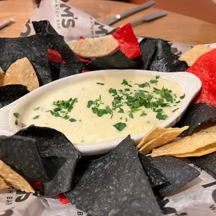 Chips and queso appetizer. Free if you join their e-club. Cheese was a little thin but we ate every crumb and drop.