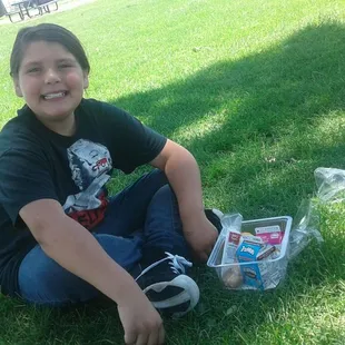 Milky enjoying her lunch in the shade