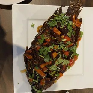 Whole tilapia with sweet chili sauce. Beautiful and very flavorful!