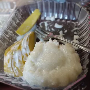 Few bites into mango and sticky rice