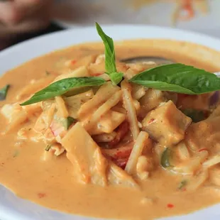 Red Curry with Chicken Extra Hot, red curry paste and coconut milk with eggplants bamboo shoots, bell peppers and basil