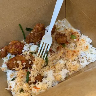 a fork in a box of rice