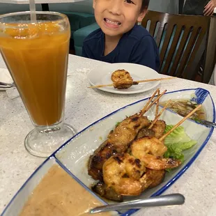 Little guy approved of the Combo Satay and the pho