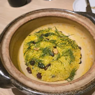 Rice with pickled raisins, pepitas, saffron oil &amp; aoili