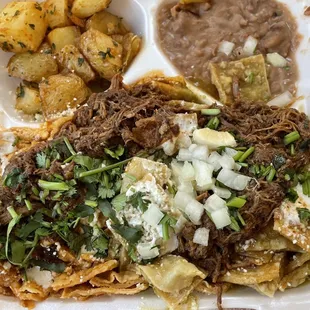 Hangover Chilaquiles with half side salsa rojos and half side salsa verdes (take-out)