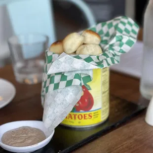 a can of tomato sauce and bread