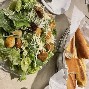 Caesar Salad and bread sticks