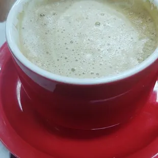 Cafe con leche! Walking through the front door and experienced a true Latin experience behind the plastic.
