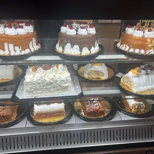 a variety of cakes on display