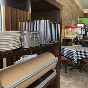 a kitchen with a table and chairs