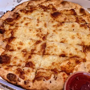 Delicious cheese and garlic bread was so tasty.